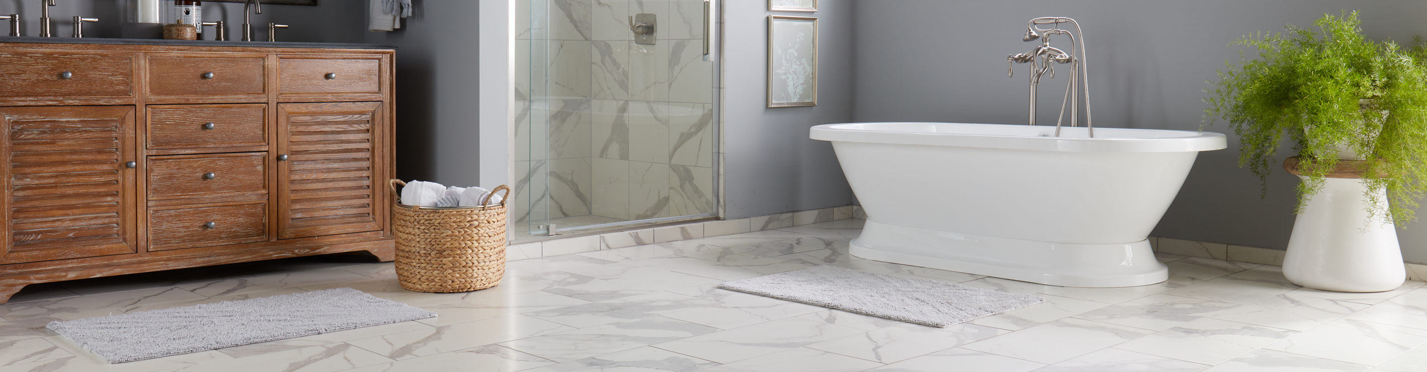 marble floor tile and shower tile in a bathroom